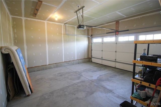 522 Chenango Hill Dr, Hamilton, NY 13346 - garage featuring a garage door opener
