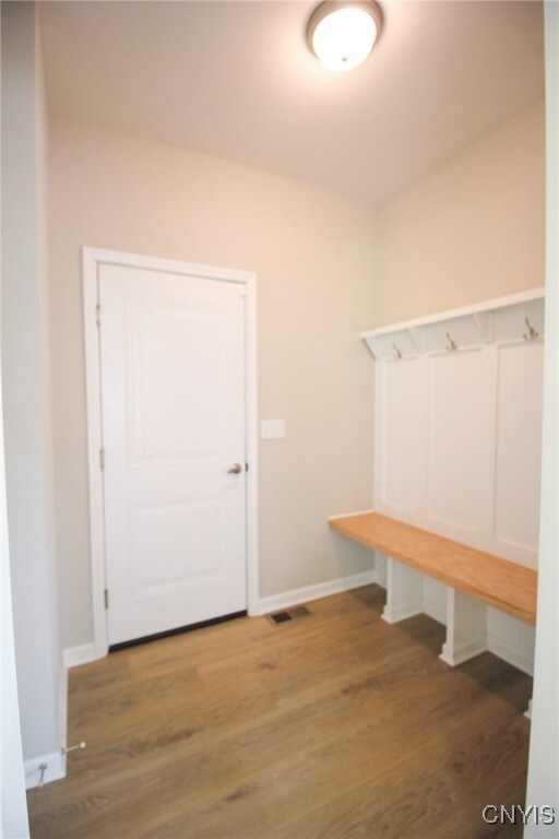522 Chenango Hill Dr, Hamilton, NY 13346 - mudroom with wood finished floors and baseboards