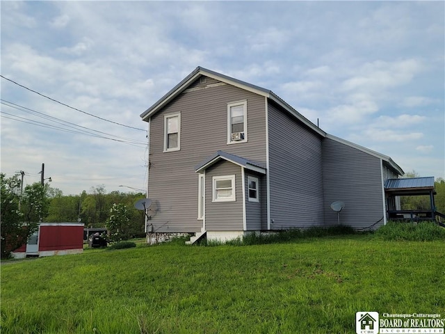 584 Warren Rd, Carroll, NY 14738 - back of property with a lawn