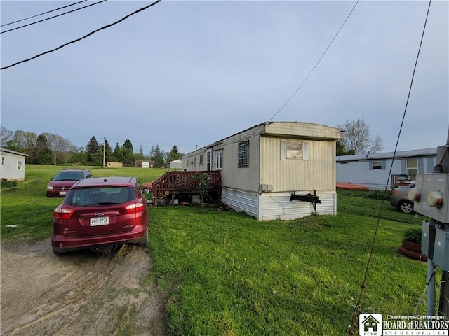 584 Warren Rd, Carroll, NY 14738 - view of property exterior with a lawn