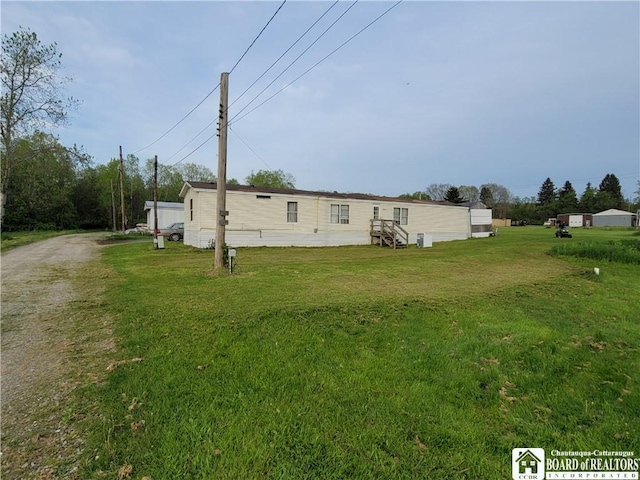 584 Warren Rd, Carroll, NY 14738 - view of front of home with a front yard, entry steps, and dirt driveway