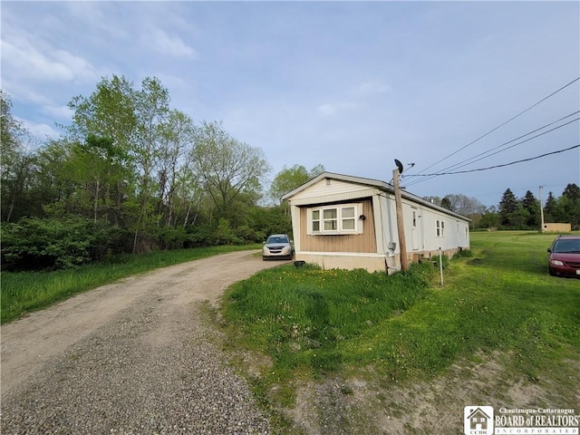 584 Warren Rd, Carroll, NY 14738 - view of front of property featuring dirt driveway and a front lawn