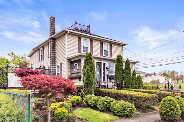 187 Clark St, Canandaigua-City, NY 14424 - view of front of property with a chimney and fence
