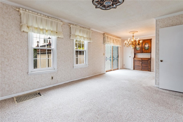 187 Clark St, Canandaigua-City, NY 14424 - spare room with ornamental molding, a chandelier, carpet flooring, healthy amount of natural light, and a textured ceiling