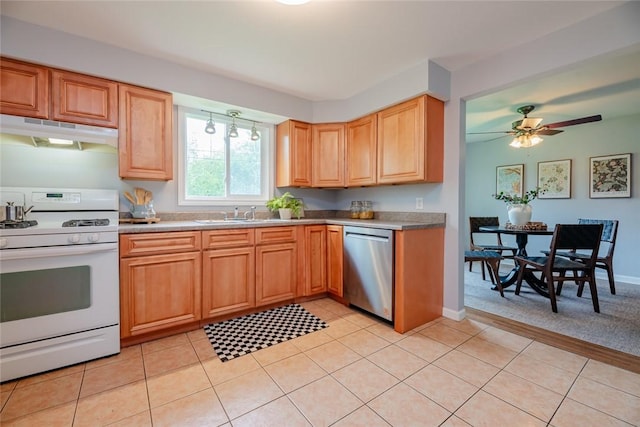kitchen with white range with gas cooktop, under cabinet range hood, dishwasher, ceiling fan, and light tile patterned flooring