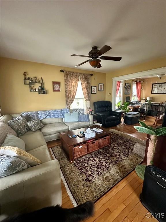 923 Teall Ave, Syracuse, NY 13206 - living room with healthy amount of natural light, a ceiling fan, and wood finished floors