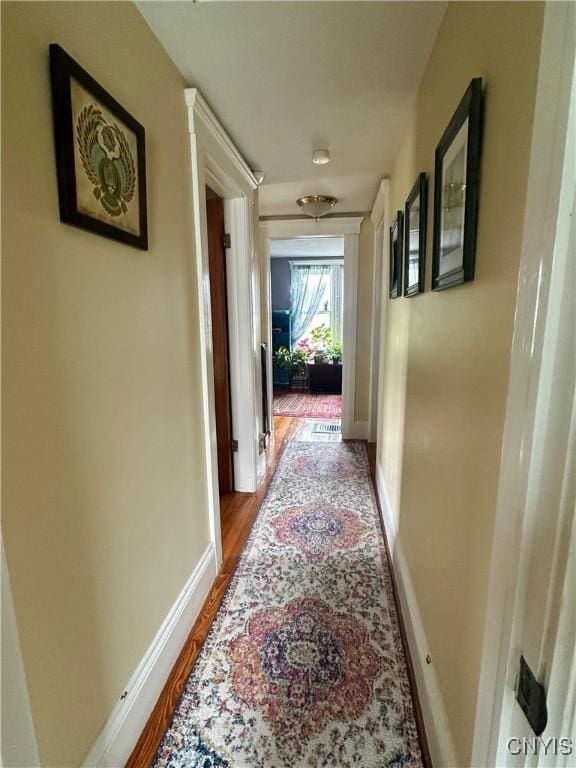 923 Teall Ave, Syracuse, NY 13206 - hallway with wood finished floors and baseboards
