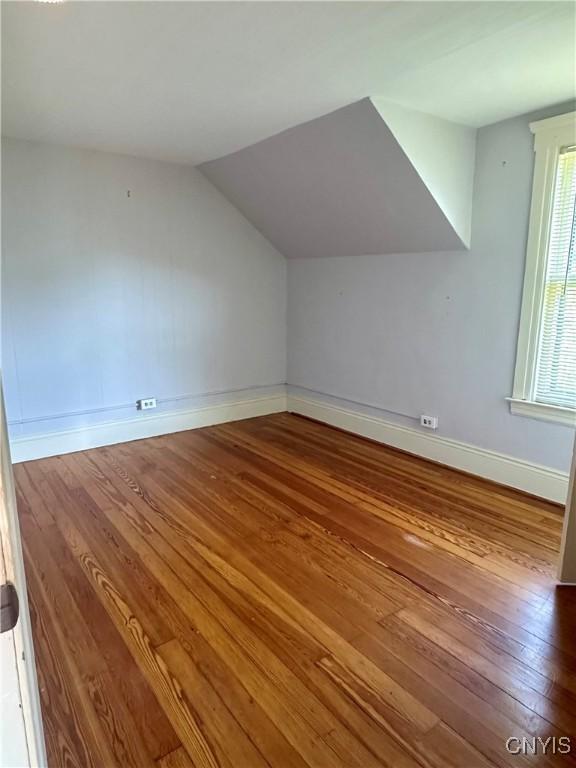 923 Teall Ave, Syracuse, NY 13206 - bonus room featuring hardwood / wood-style flooring and vaulted ceiling