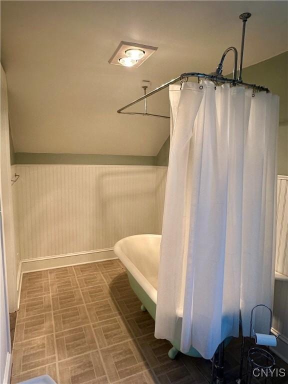 923 Teall Ave, Syracuse, NY 13206 - bathroom featuring a bathtub and curtained shower