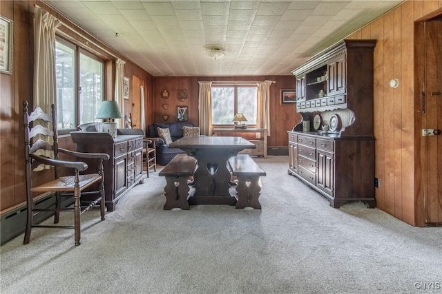 37931 State Route 12e, Clayton, NY 13624 - dining area with light carpet and wooden walls
