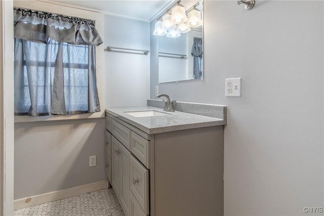 37931 State Route 12e, Clayton, NY 13624 - bathroom featuring vanity, baseboards, a chandelier, and tile patterned floors
