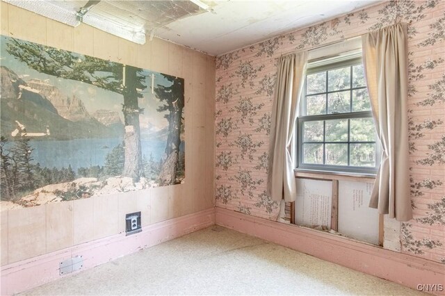 37931 State Route 12e, Clayton, NY 13624 - unfurnished room with wallpapered walls and baseboards