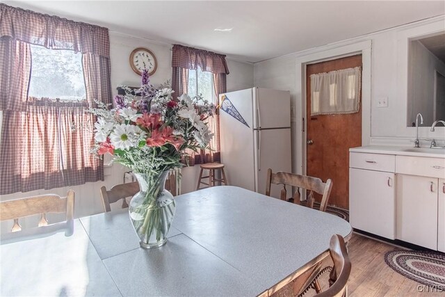 37931 State Route 12e, Clayton, NY 13624 - dining space with wood finished floors