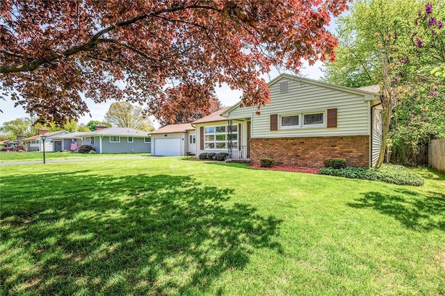 view of front of home with brick siding and a garage