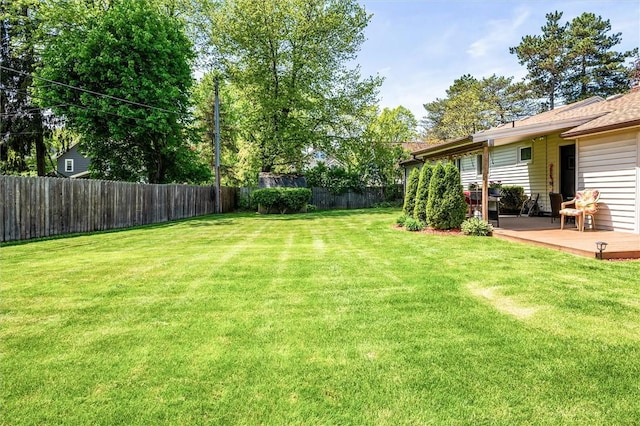 view of yard featuring a deck
