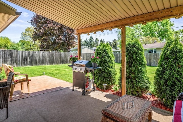view of patio featuring grilling area and a wooden deck