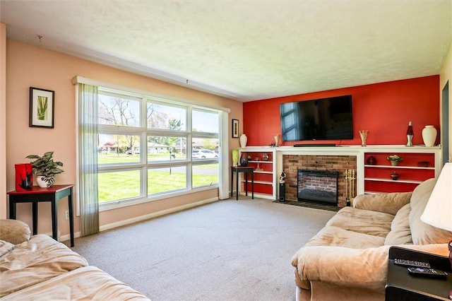carpeted living area featuring healthy amount of natural light, a fireplace, and baseboards