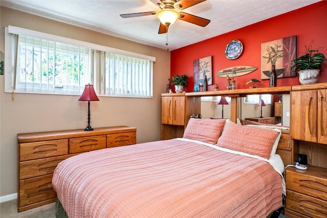 bedroom featuring carpet and a ceiling fan