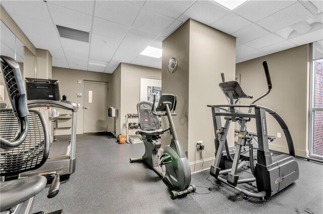 132 Lakefront Blvd Unit 104, Buffalo, NY 14202 - workout area featuring a paneled ceiling and baseboards