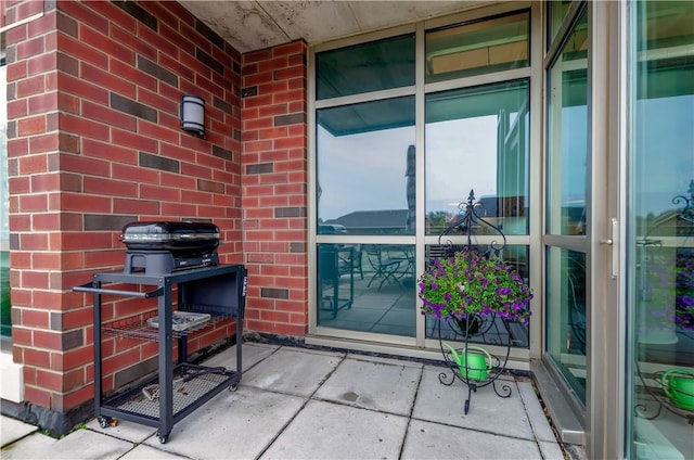 132 Lakefront Blvd Unit 104, Buffalo, NY 14202 - view of exterior entry featuring brick siding