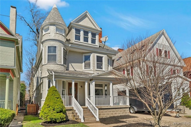656 Auburn Ave, Buffalo, NY 14222 - victorian home featuring a porch