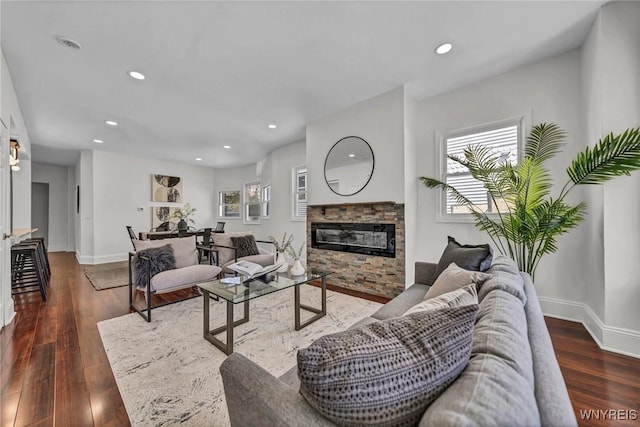 656 Auburn Ave, Buffalo, NY 14222 - living room featuring a fireplace, healthy amount of natural light, baseboards, hardwood / wood-style floors, and recessed lighting