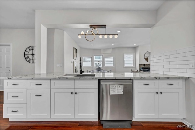 656 Auburn Ave, Buffalo, NY 14222 - kitchen with stainless steel dishwasher, light stone counters, white cabinets, dark wood-style flooring, and recessed lighting