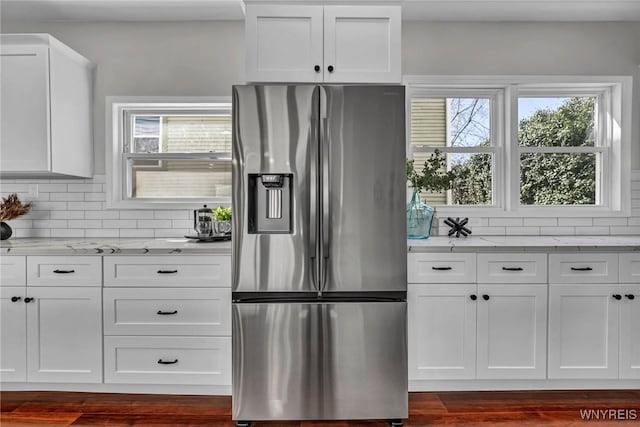 656 Auburn Ave, Buffalo, NY 14222 - kitchen with stainless steel refrigerator with ice dispenser, tasteful backsplash, white cabinets, and dark wood finished floors