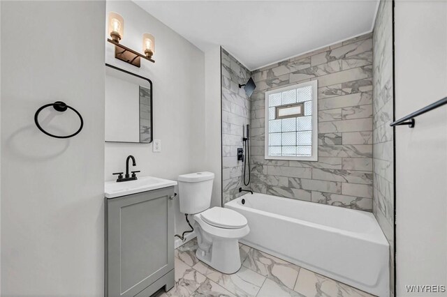 656 Auburn Ave, Buffalo, NY 14222 - bathroom featuring marble look tile flooring, toilet, vanity, and bathing tub / shower combination