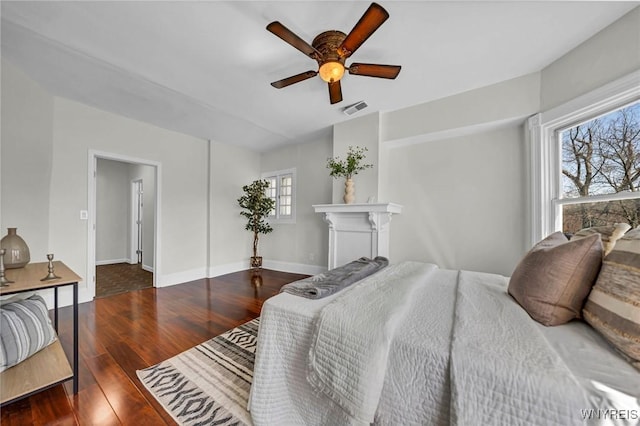 656 Auburn Ave, Buffalo, NY 14222 - bedroom featuring wood finished floors, baseboards, and a ceiling fan