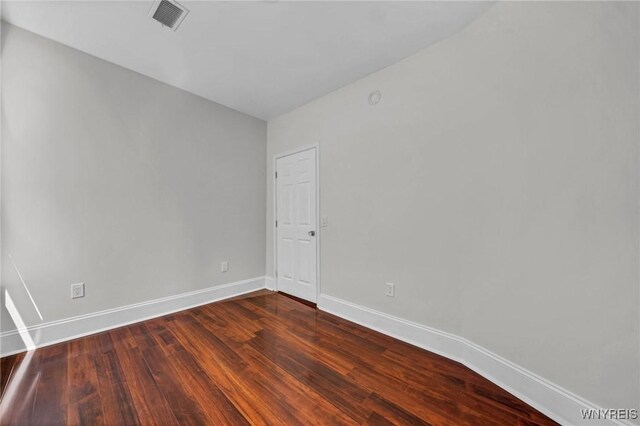 656 Auburn Ave, Buffalo, NY 14222 - empty room with baseboards and dark wood-type flooring