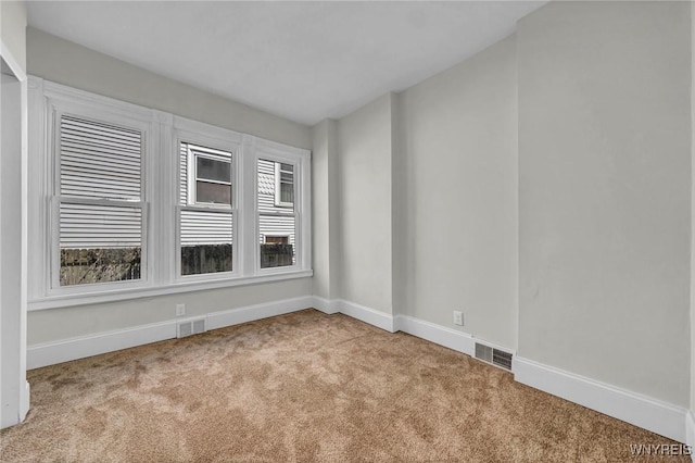 656 Auburn Ave, Buffalo, NY 14222 - carpeted empty room with baseboards