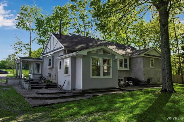 back of property featuring stucco siding and a patio area