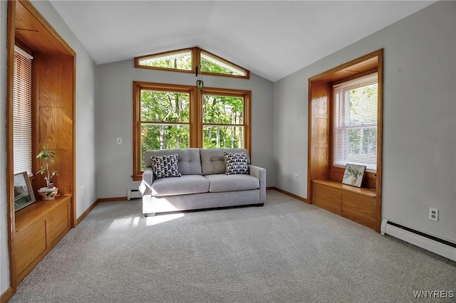 living area featuring a baseboard radiator, lofted ceiling, plenty of natural light, and carpet flooring