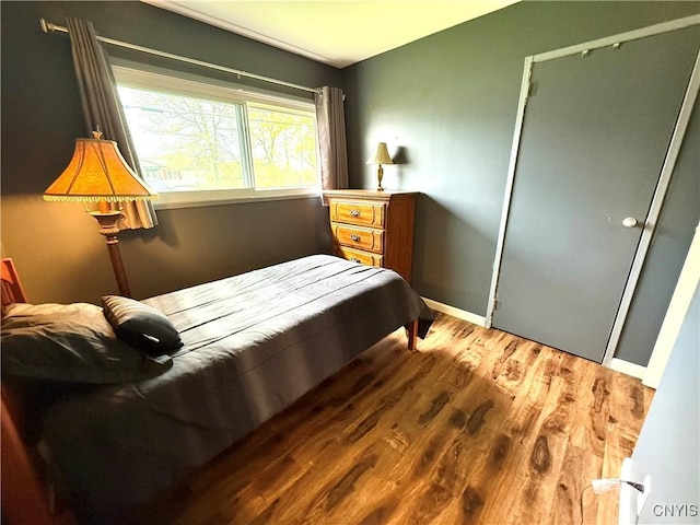 1004 W Thomas St, Rome-Inside, NY 13440 - bedroom with wood finished floors