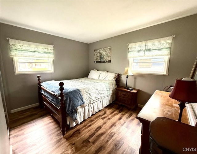 1004 W Thomas St, Rome-Inside, NY 13440 - bedroom with wood finished floors and baseboards
