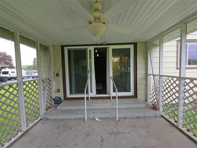 5 Suburban Dr, Big Flats, NY 14903 - unfurnished sunroom featuring a ceiling fan