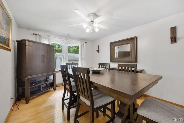 108 Pineledge Rd, Camillus, NY 13031 - dining room featuring light wood-type flooring and a ceiling fan
