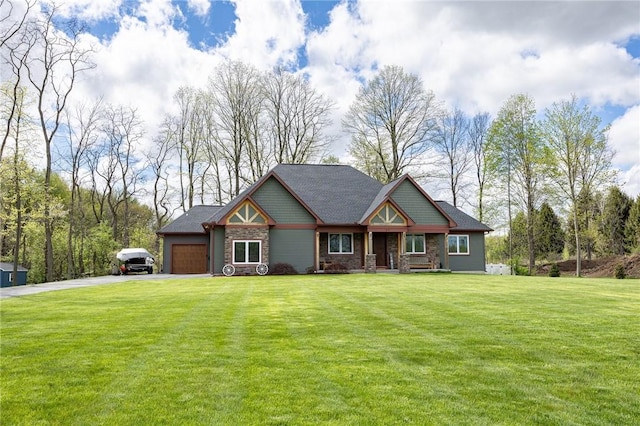 craftsman inspired home featuring driveway, a garage, a front lawn, and stone siding