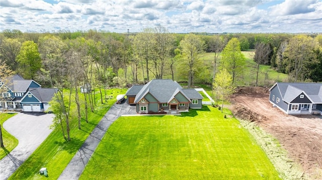 view from above of property featuring a forest