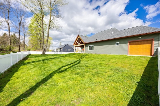 view of yard featuring an attached garage