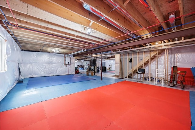 unfinished basement with stairway