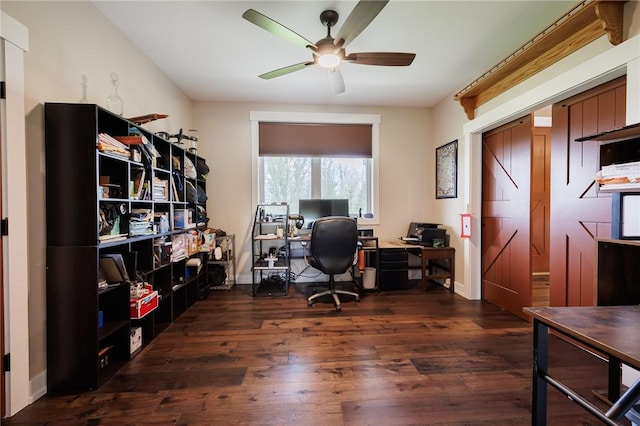 home office with ceiling fan, wood-type flooring, and baseboards