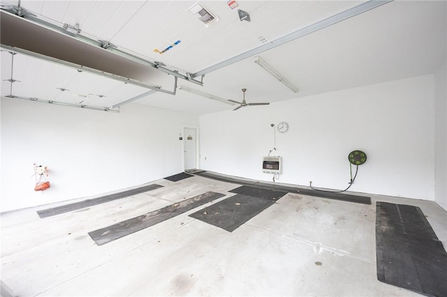 garage featuring heating unit