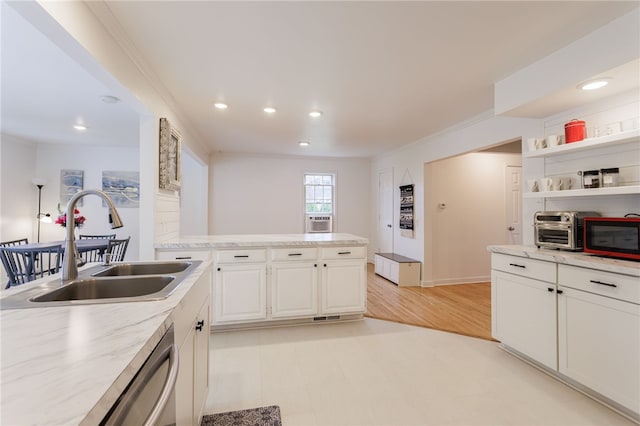 137 Vine St, Batavia-City, NY 14020 - kitchen with a sink, white cabinets, dishwasher, a peninsula, and recessed lighting