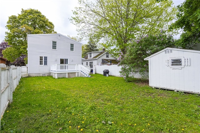 137 Vine St, Batavia-City, NY 14020 - back of property featuring a deck, an outdoor structure, a storage unit, and crawl space
