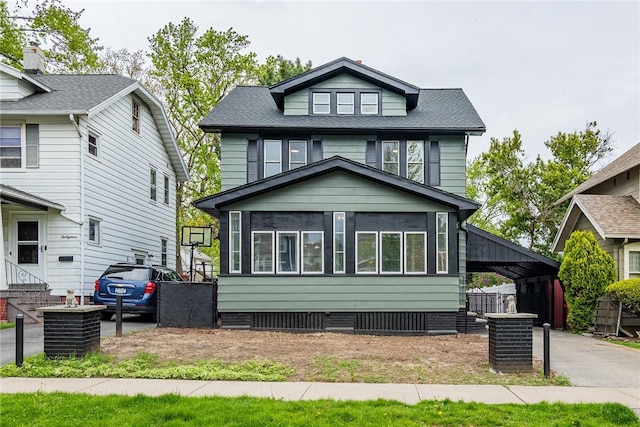 traditional style home with crawl space, a sunroom, a carport, and fence
