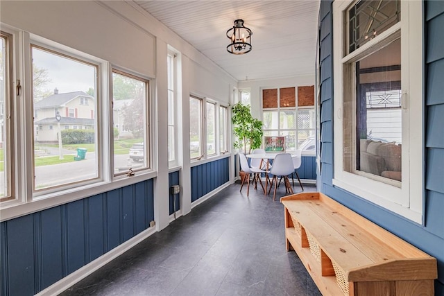 sunroom with concrete floors