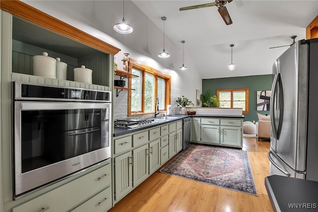 9466 Ridge Rd, Hartland, NY 14105 - kitchen with stainless steel appliances, dark countertops, a peninsula, open shelves, and light wood finished floors