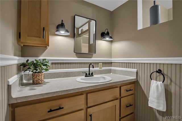 9466 Ridge Rd, Hartland, NY 14105 - bathroom with wainscoting and vanity